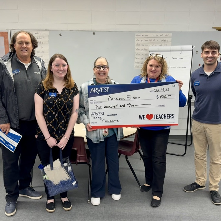 teacher being rewarded