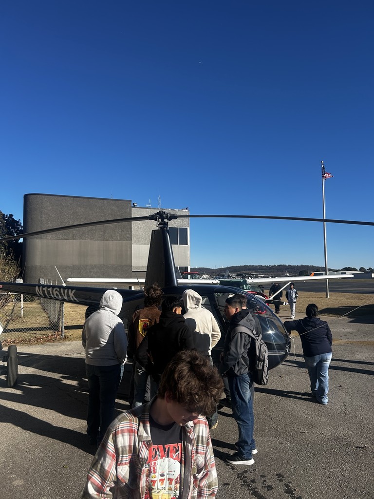 students touring airport