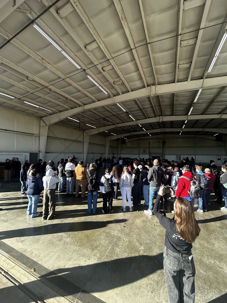 students touring airport