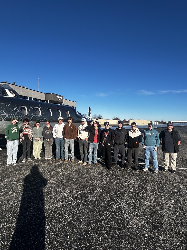 students touring airport