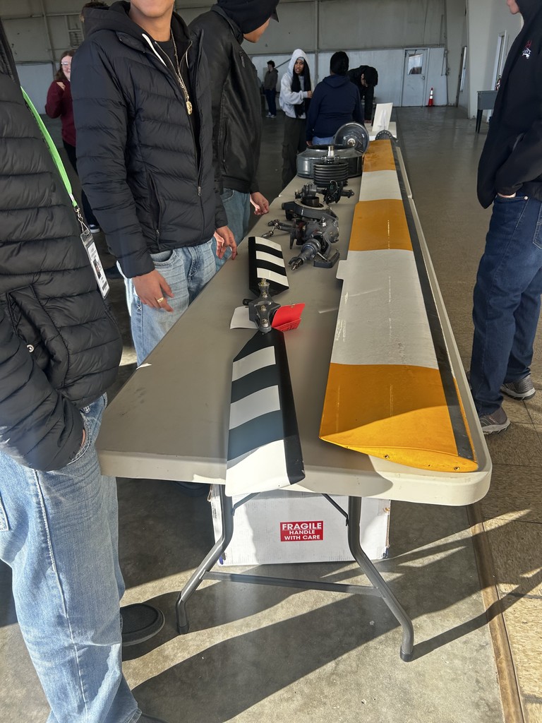 students touring airport