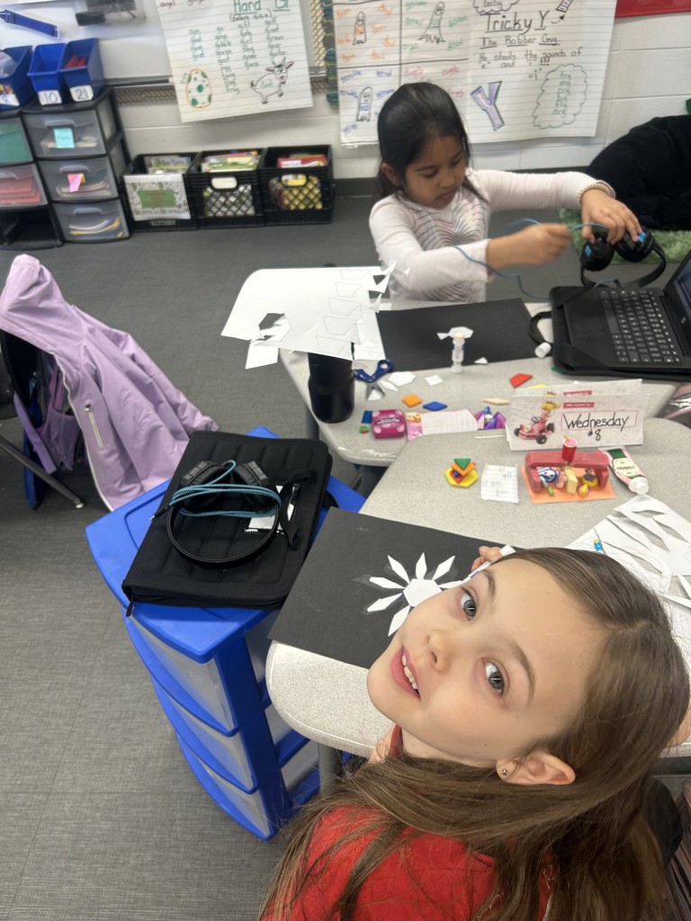 students doing snowflake lesson