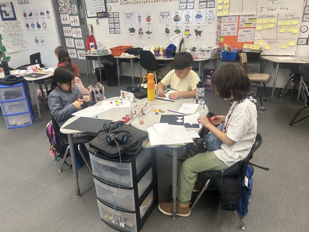 students doing snowflake lesson