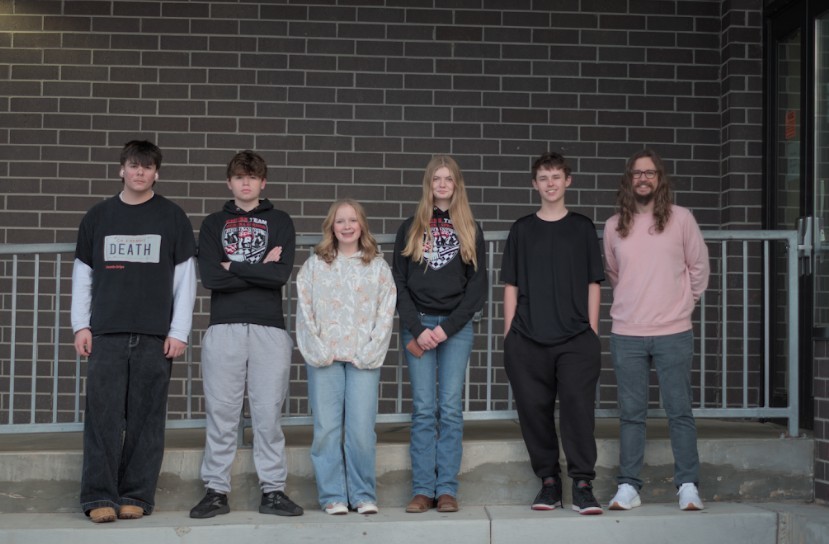 students posing at chess tournament