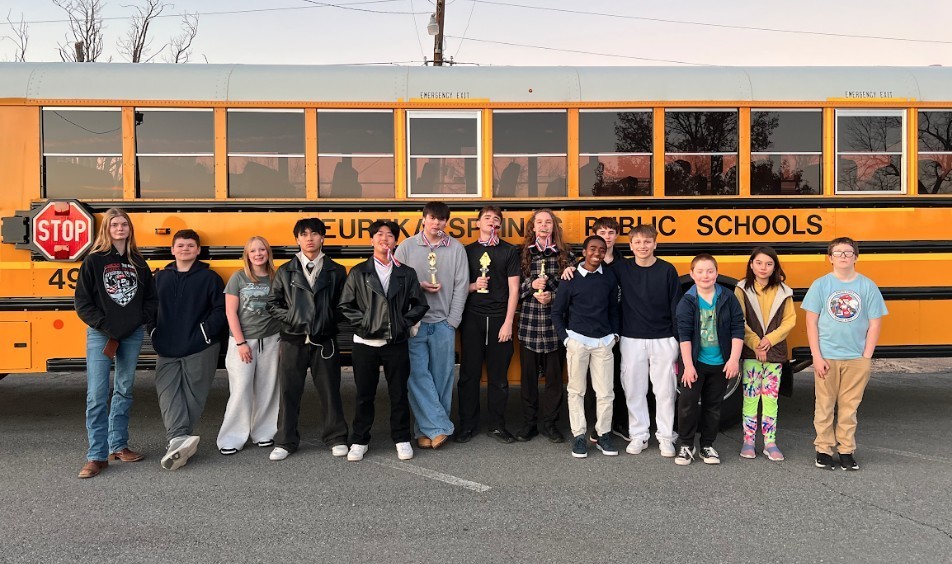 students posing at chess tournament