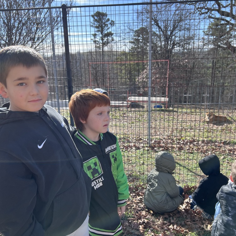 students visiting animal refuge