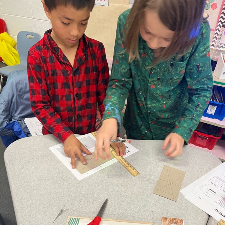 students doing a science project with frogs