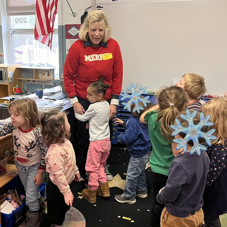 children hugging woman