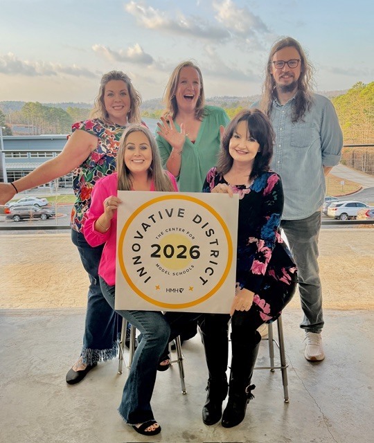 group of people posing for photo