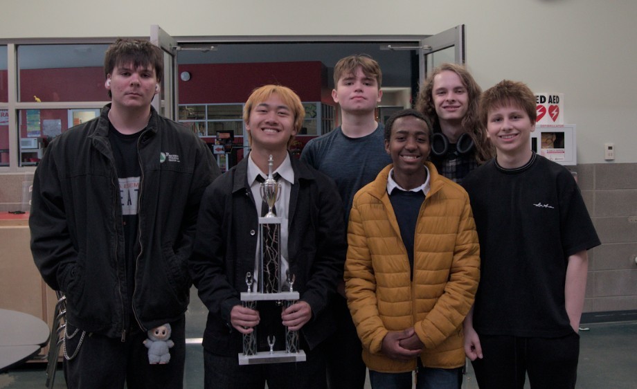 students posing for chess