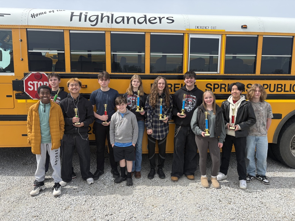 students with trophies