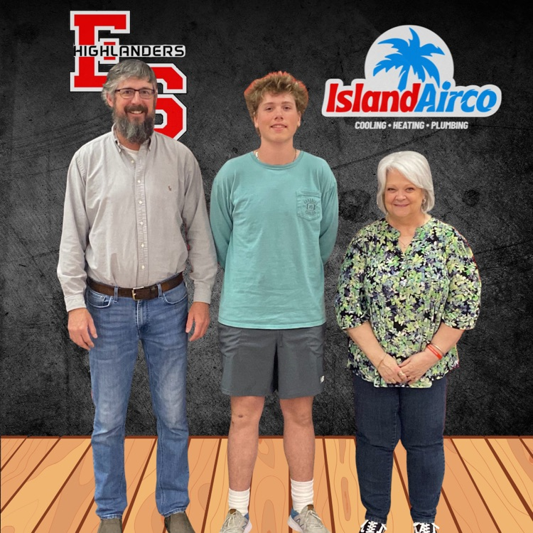 student posing for baseball