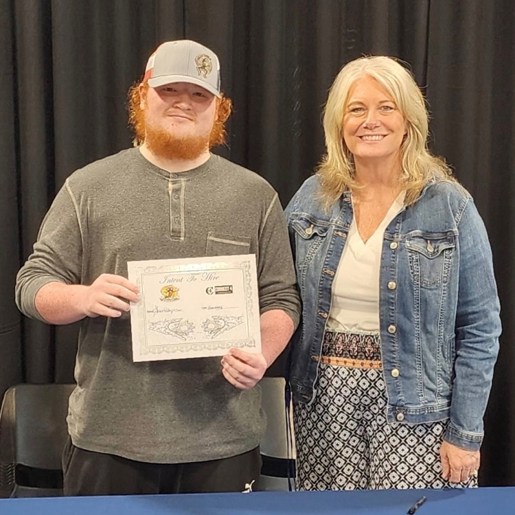 student and adult posing 