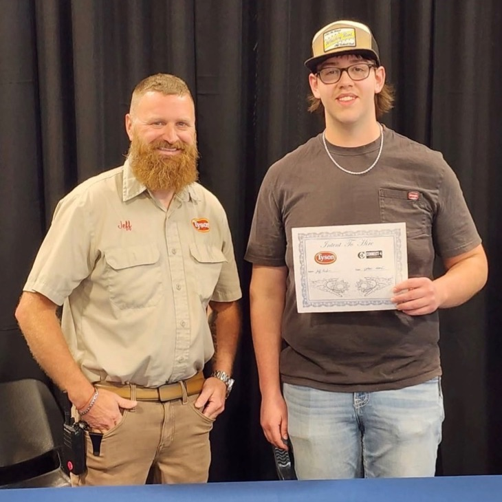 student and adult posing 