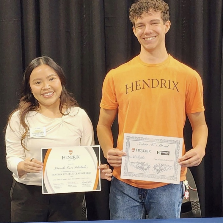 student and adult posing 