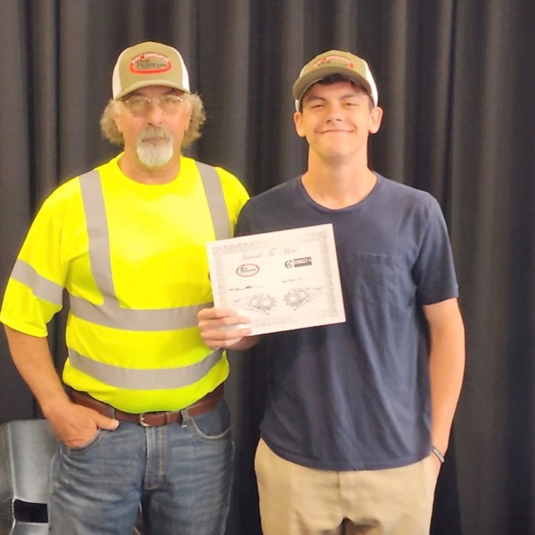 student and adult posing 