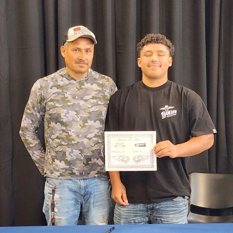 student and adult posing 