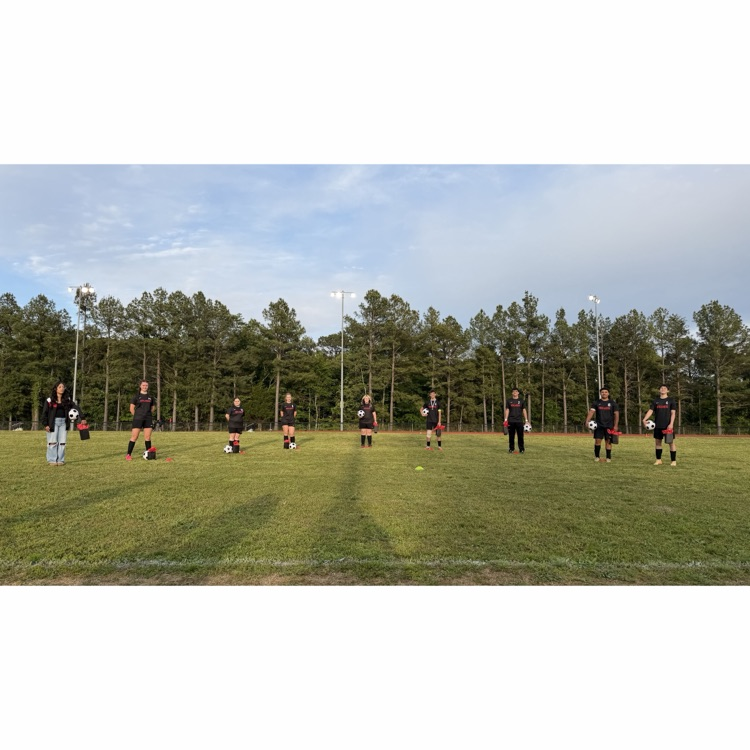 soccer players posing
