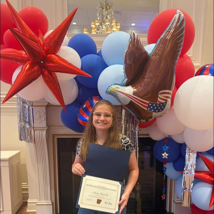 Anna vaverka holding certificate