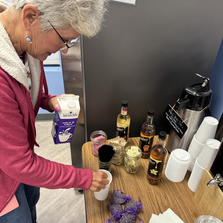 woman making coffee