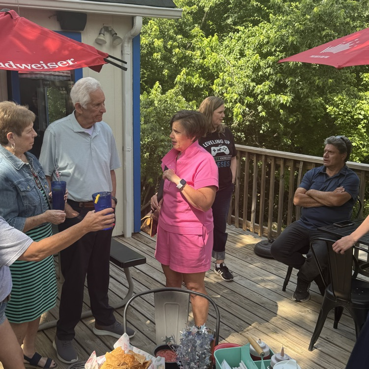 lady and guests at retirement party 