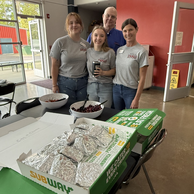 people serving breakfast