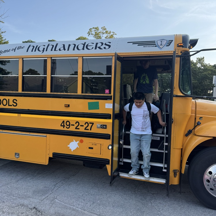 students exiting bus