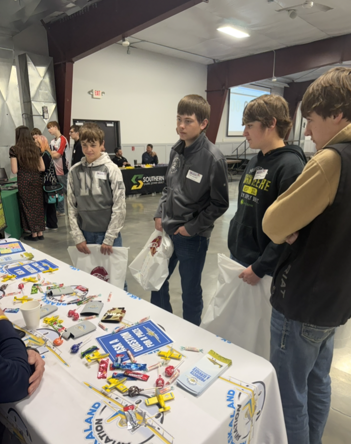 boys standing by table