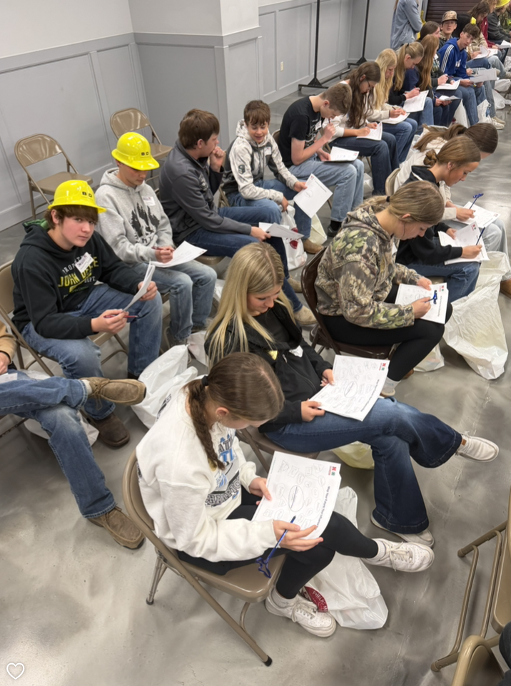 student making connections on paper