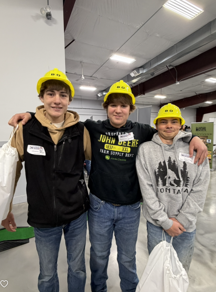 construction hats on students
