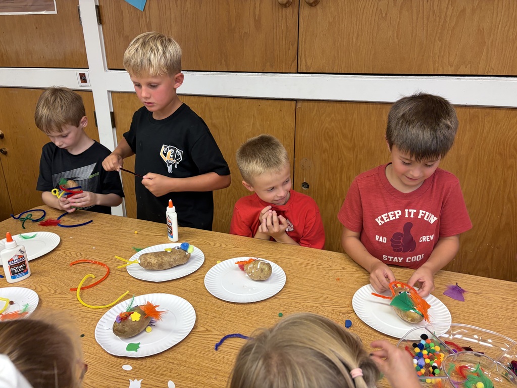 students with their potato creations