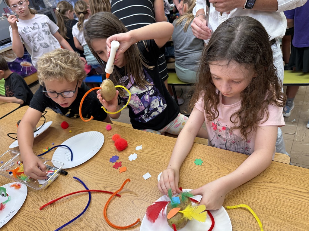students with their potato creations