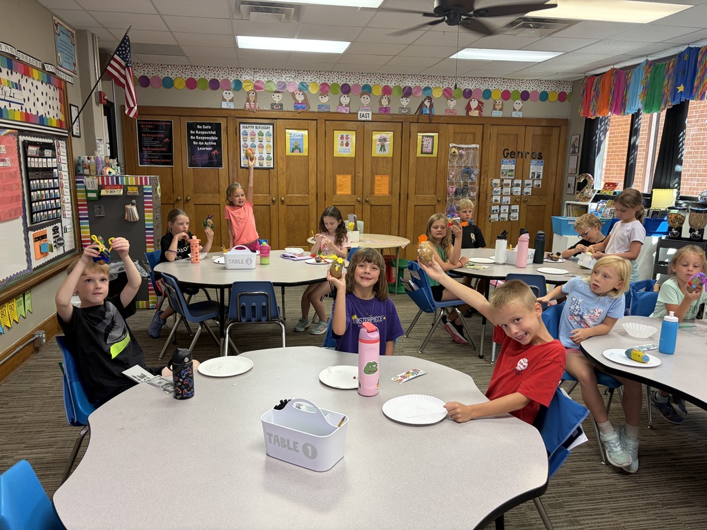 2nd grade students with their potato creations