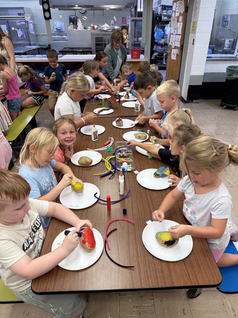 students with their potato creations