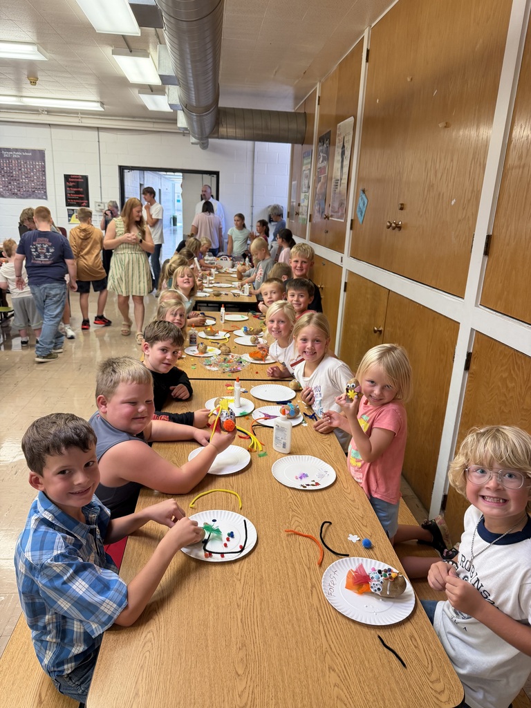 1st grade students with their potato creations