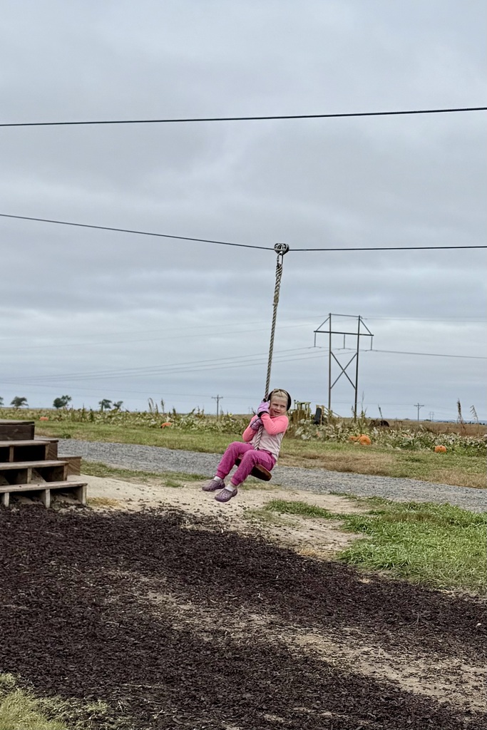 Girl riding on zipline