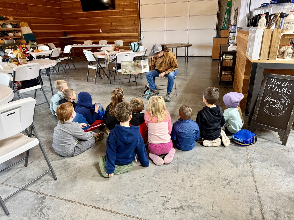 PreK students listening to a story