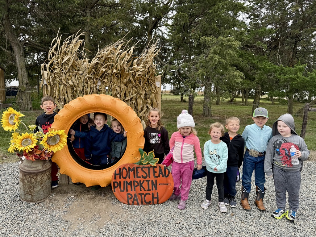 PreK class in front of homstead pumpkin patch sign