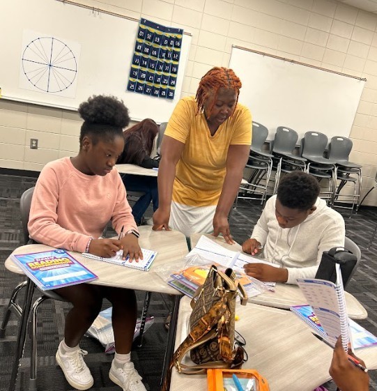 Reading practice with students and teacher