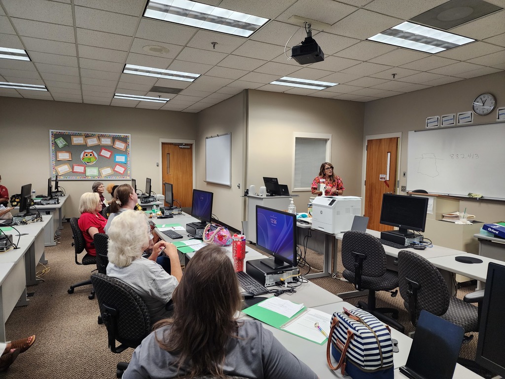 School Nutrition employees learning about providing  customer service