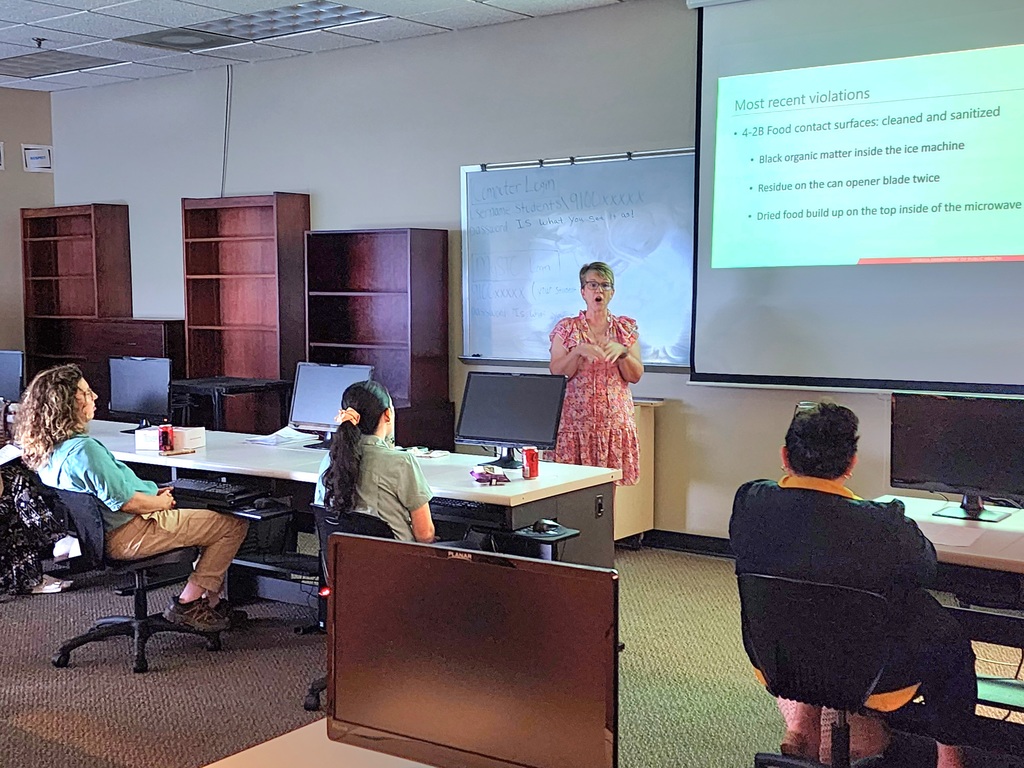 School nutrition employees learning about health inspections