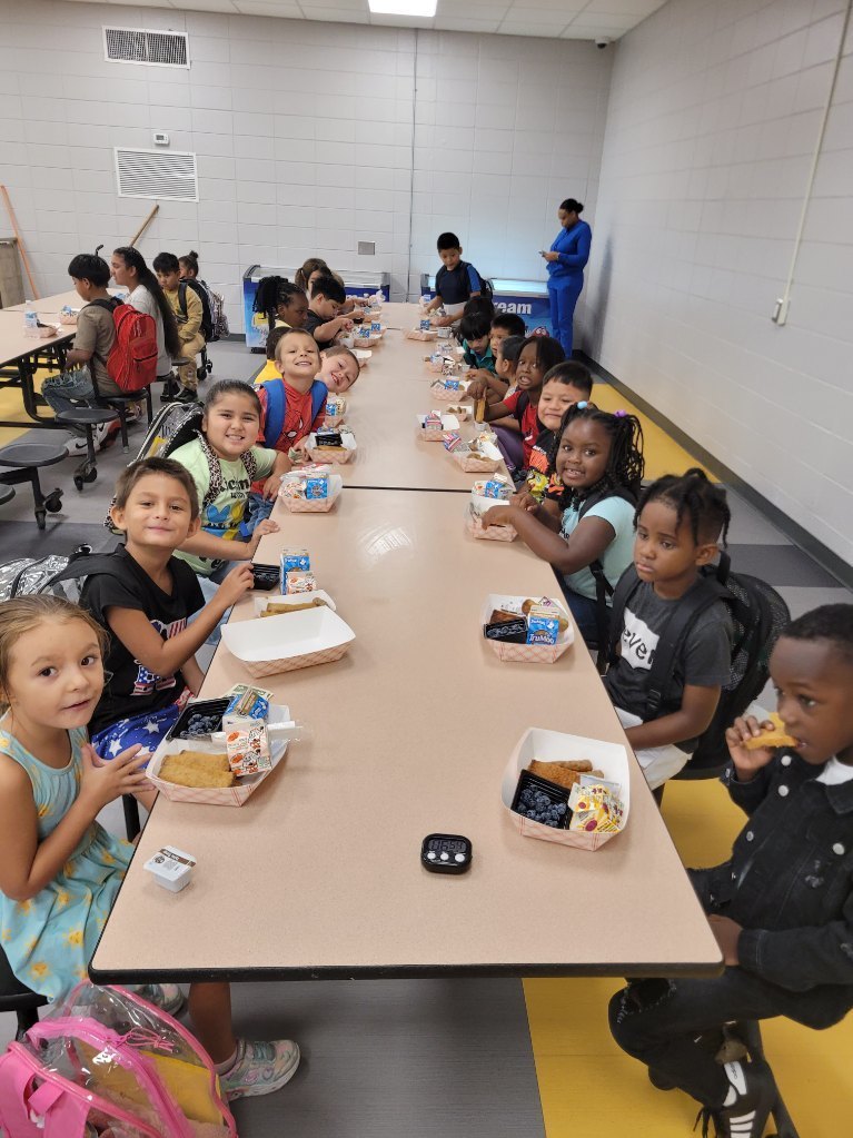 Children eating breakfast at Claxton Elementary School.