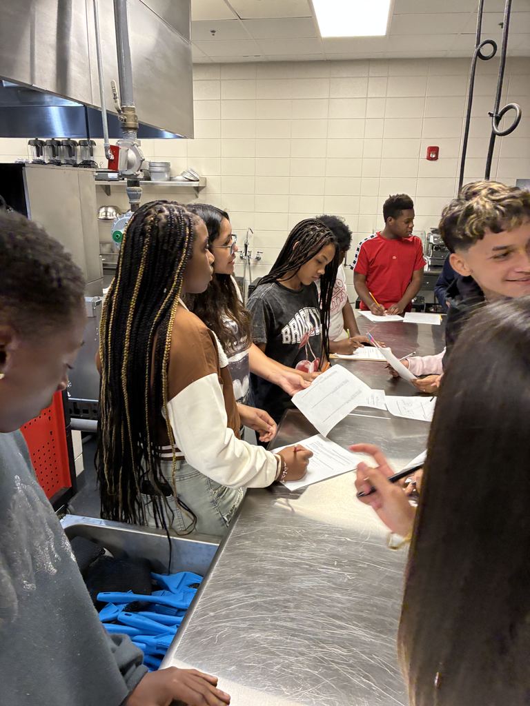 ✨👩‍🍳🔍 Students in Coach McLean’s High School Transitions class stepped into the Culinary Arts department for a hands-on scavenger hunt inside the commercial kitchen!  Working in teams, they explored key stations—hot line, prep, storage, and dishwashing—matched tools to their proper areas, and decoded real menu vocabulary. 🍴📋  Coach McLean shared, “The scavenger hunt helped our students connect career skills with real workplace spaces.”  Culinary Arts Instructor, Mrs. Cindy Hart and her students also showcased professional table settings 🍽️ and reinforced the importance of kitchen safety ✅.  The visit wrapped up with a debrief on teamwork, communication, and professionalism—skills at the heart of the Transitions course. 💡🤝  #HandsOnLearning #CulinaryArts #CareerReady #Teamwork #Communication #Professionalism #EvansCountySchools #TheDen
