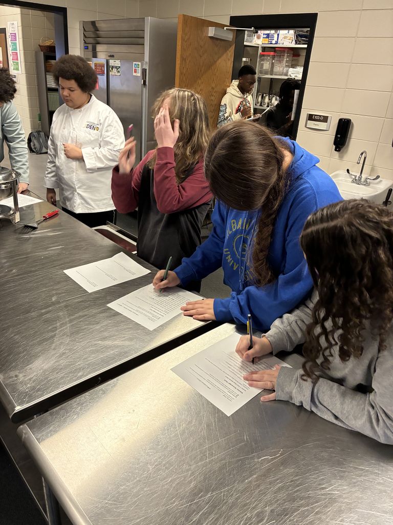 ✨👩‍🍳🔍 Students in Coach McLean’s High School Transitions class stepped into the Culinary Arts department for a hands-on scavenger hunt inside the commercial kitchen!  Working in teams, they explored key stations—hot line, prep, storage, and dishwashing—matched tools to their proper areas, and decoded real menu vocabulary. 🍴📋  Coach McLean shared, “The scavenger hunt helped our students connect career skills with real workplace spaces.”  Culinary Arts Instructor, Mrs. Cindy Hart and her students also showcased professional table settings 🍽️ and reinforced the importance of kitchen safety ✅.  The visit wrapped up with a debrief on teamwork, communication, and professionalism—skills at the heart of the Transitions course. 💡🤝  #HandsOnLearning #CulinaryArts #CareerReady #Teamwork #Communication #Professionalism #EvansCountySchools #TheDen