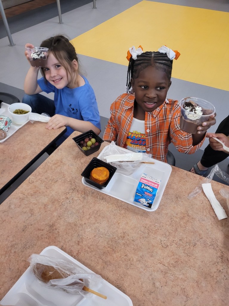 Students at CES with Chocolate Pudding 