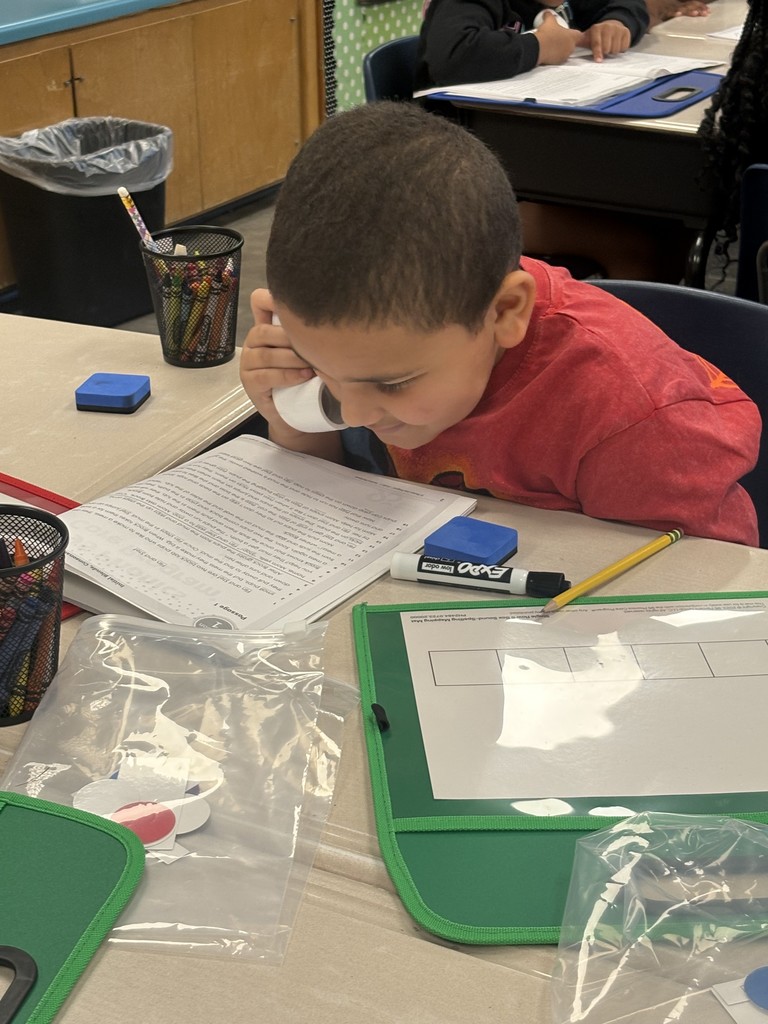🔍📚 Reading Detectives at Work! 🕵️‍♀️✨  Mrs. Phillips’ class is working hard to boost their reading skills — whether diving into literary stories or searching for text features in nonfiction texts. They are smart detectives, uncovering meaning on every page!
