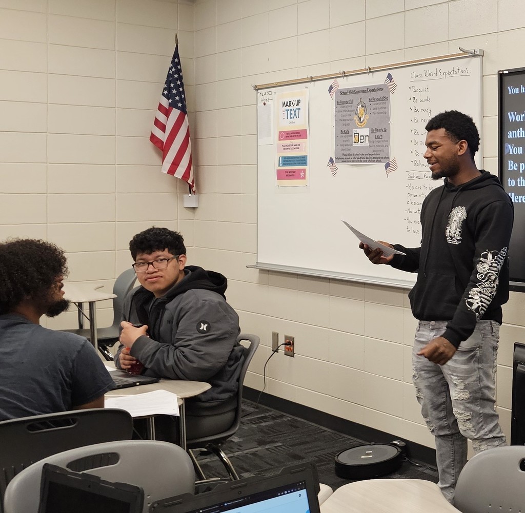 Picture showing 📚 Learning History Through Music! 🎶✨  Mr. Lewis’s U.S. History classes at Claxton High School have been diving into the Early Republic, including the War of 1812—the time when the Star-Spangled Banner was written! ⭐  As a fun and creative project, students worked in small groups to write their own song. 🎤🎶 They then performed their songs for the class!💡👏  We are so proud of our Tigers 🐯 repping the Black & Gold 🖤💛 with pride and talent!  #ClaxtonHigh #TigerPride #BlackAndGold #HistoryInAction #WarOf1812 #StarSpangledBanner #StudentVoices