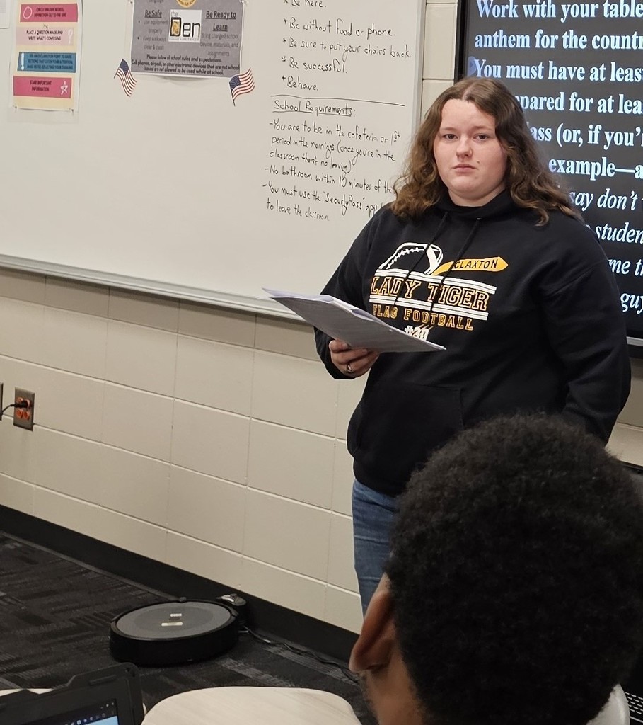 Picture showing 📚 Learning History Through Music! 🎶✨  Mr. Lewis’s U.S. History classes at Claxton High School have been diving into the Early Republic, including the War of 1812—the time when the Star-Spangled Banner was written! ⭐  As a fun and creative project, students worked in small groups to write their own song. 🎤🎶 They then performed their songs for the class!💡👏  We are so proud of our Tigers 🐯 repping the Black & Gold 🖤💛 with pride and talent!  #ClaxtonHigh #TigerPride #BlackAndGold #HistoryInAction #WarOf1812 #StarSpangledBanner #StudentVoices