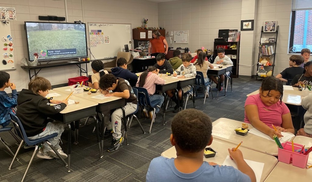 students learning about apples