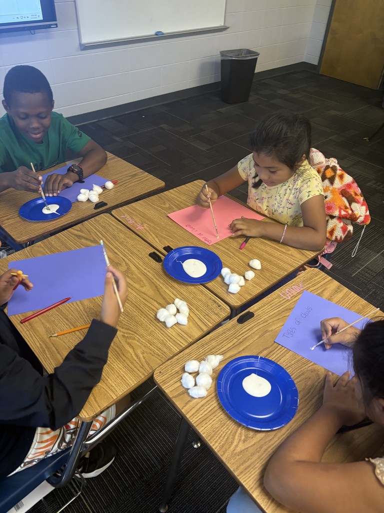 4th graders learning about clouds